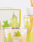 Close-up detail of Baobab Miami Gift Set packaging, candle, and diffuser showcasing artistic glass design of Miami skyline, fresh scent notes of maritime pine and cypress, available at Spacio India