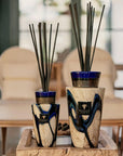 Elegantly styled Baobab Stones Lazuli Mini Totem Diffusers displayed on a rustic wood table, sophisticated home fragrance from Baobab Collection at Spacio India.