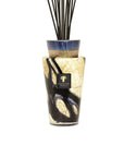 Close-up of Baobab Stones Lazuli Mini Totem diffuser featuring sophisticated blue and gold glass design, available online at Spacio India.