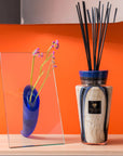 Baobab Stones Lazuli Diffuser Totem set displayed on rustic wooden furniture, creating a refined luxury decor atmosphere, offered by Spacio India.