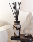 Elegant Baobab Stones Marble Diffuser Totem 2L placed beside contemporary decor, showcasing sophisticated glass craftsmanship and leather fragrance, available at Spacio India retail stores and online.