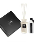 Baobab White Pearl Diffuser Totem set with refill bottle, presented in sophisticated black packaging, highlighting feminine fragrance notes, available at Spacio India retail and online.