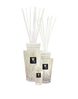 Elegant set of three Baobab White Pearl Diffuser Totems in varying sizes, crafted from premium glass and filled with a delicate musk and freesia scent, available at Spacio India.