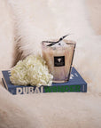Baobab White Pearls Candle styled with floral decor and book, creating a luxurious wellness corner – shop now at Spacio India.