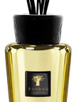 Close-up of the Baobab Aurum Diffuser 500ml with embossed black cap and gold glass finish, showcasing the premium craftsmanship offered by Baobab Collection, now at Spacio India.