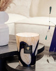 Decorative Baobab Stones Lazuli Candle glowing softly on a modern centre table – infused with sea salt, musk, and cardamom