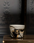 Baobab Stones Marble Candle displayed on a luxe shelf with classical grey wall backdrop, ideal for refined Indian homes
