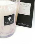 Baobab Collection candle with packaging on a white background