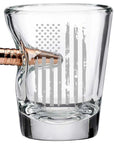 Clear glass shot glass with a bullet-shaped handle on a white background from the American brand Benshot available at Spacio retail stores in Mumbai & Kolkata.