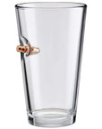 Clear beer pint glass with a bullet on a white background from the American brand Benshot available at Spacio retail stores in Mumbai & Kolkata.