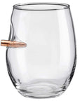 Clear wine glass with a bullet-shaped object inside on a white background from American brand Benshot available at Spacio retail stores in Mumbai & Kolkata.