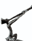 A high-quality Butzon Bercker Zest For Life II sculpture of a man playing a trumpet.