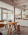 In the tube suspension lights from DCW Editions in a cafe