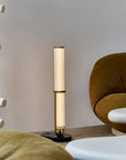 La Lampe Frechin table lamp on the floor by DCW Editions