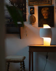 Sculptural table lamp from DCW Editions in a dark room