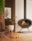 Oval front legs wood burning fireplace by Dru Dik Geuts available at Spacio in India.