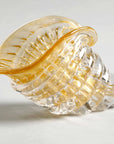 Detailed close-up of the golden-rimmed crystal cornucopia art object from Duccio Di Segna, sold by Spacio India