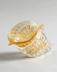Close-up view of Duccio Di Segna crystal cornucopia in amber and gold, premium decor from Spacio India