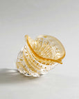 Side angle of luxury amber and gold crystal cornucopia from Duccio Di Segna, decor item at Spacio India