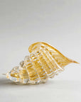 Rear view of Duccio Di Segna crystal cornucopia sculpture with golden highlights, art decor at Spacio India