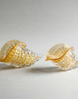 Detailed close-up of Duccio Di Segna Cornucopia spiral form in crystal and gold, elegant home accessory sold at Spacio India