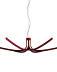 Modern suspension light with red accents on a white background from Foscarini available at Spacio retail stores in Mumbai & Kolkata.