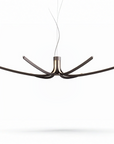 Modern pendant light with five arms on a white background