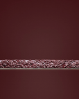 Decorative suspension lamp with intricate carvings on a dark red background