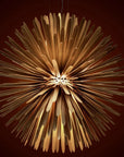 Decorative suspension light fixture with a unique design on a dark background