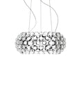 Modern pendant light with a bubble-like design on a white background from Foscarini available at Spacio retail stores in Mumbai & Kolkata.