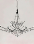 Modern chandelier with geometric design on a plain background