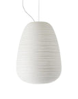 White pendant lamp with a ribbed texture on a white background from Foscarini available at Spacio retail stores in Mumbai & Kolkata.