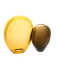 A close up of a Gardeco Glass Sculpture Close Encounter Large Fume Amber by Stefan Sch̦ning.