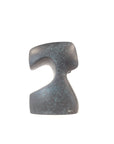 Blue green patina finish bronze sculpture on a white background