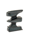 Gray metal sculpture on a white background