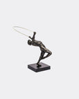 Bronze sculpture of a figure with a hoop on a white background