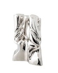 Bronze sculpture in polished finish on a white background