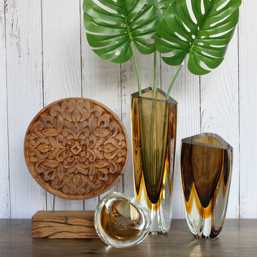 A contemporary refinement of Gardeco Glass Vase Triangle 3 Fume Amber, featuring bicolour glass and the Gardeco Vase Triangle design.