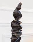 Angled perspective of the Gardeco Storm Bronze Sculpture (Limited Edition) highlighting its textured bronze surface and artistic curves, available at Spacio India.
