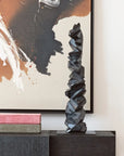 Elegant room setup featuring the Gardeco Storm Bronze Sculpture (Limited Edition) as a centerpiece, part of the curated art collection at Spacio India.