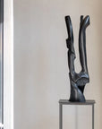 Gardeco Wings Bronze Sculpture displayed elegantly on a minimal pedestal, enhancing luxury interiors. Exclusive to Spacio India retail stores and online.