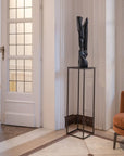 Elegant Gardeco Wings Bronze Sculpture on a contemporary stand, showcasing abstract artistry. Limited Edition bronze artwork by Gardeco, available at Spacio India retail stores and online. Ideal for luxury home decor and interior styling.