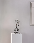 Close-up of Gardeco To Return bronze sculpture highlighting textured details, part of Spacio India’s limited edition luxury art collection.