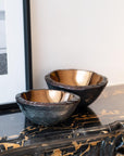 Gardeco P Bronze Bowls styled on a marble console, blending glass artistry with interior elegance – a designer statement from Gardeco, featured exclusively at Spacio India.