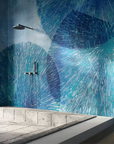 An interior bathroom with a blue tiled wall, promoting wellness and featuring the Glamfusion Hydra Hydronetta from Glamora Collection.