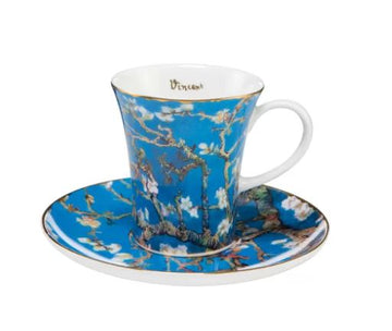 A Goebel Vincent Van Gogh Almond Tree Blue Tea Cup 67021201 with an almond tree on it, inspired by artwork.