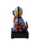Colorful ceramic dog figurine on a white background