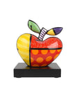 Colorful apple-shaped sculpture on a white background by Romero Britto available at Spacio retail and online stores in India.