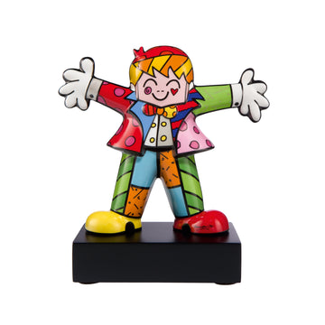 A colorful figurine of a Goebel Romero Britto Hug Too porcelain sculpture with his arms outstretched.