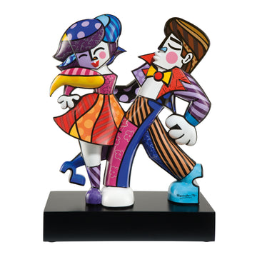 A Goebel Limited Edition Swing Ceramic Sculpture of a couple dancing on a black base, designed by Romero Britto.